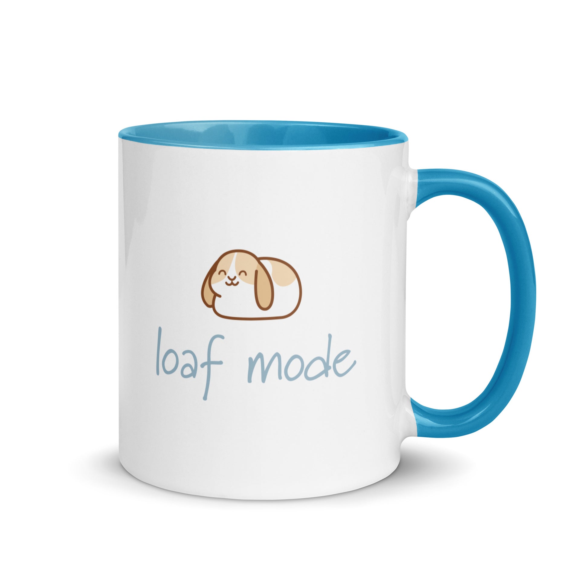 Mug with blue interior and handle featuring a cartoon bunny and 'loaf mode' text on a white background