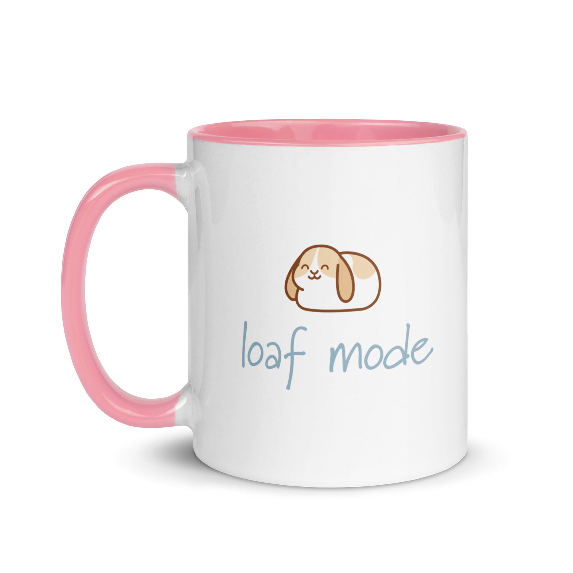Mug with pink handle and interior, featuring a cartoon bunny and 'loaf mode' text on a white background.
